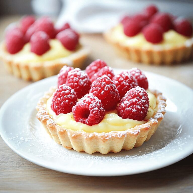 Elegant Vanilla Cream Tarts With Fresh Raspberries Recipe